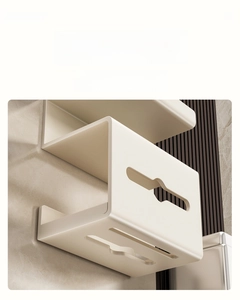 Close-up of cream white wall-mounted shelf showing thick material and smooth rounded edges