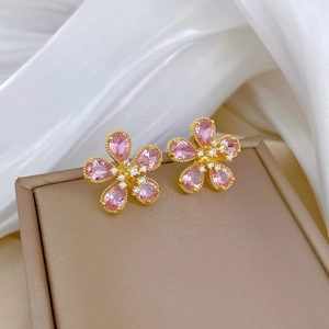 Parure de bijoux en acier titane avec fleurs roses serties de strass brillants