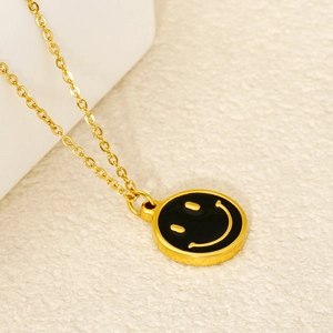 Chic 18k gold plated stainless steel necklace with a black enamel smiley face pendant