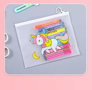 Detail view of frosted unicorn stationery bag with smooth ring zipper and colorful markers