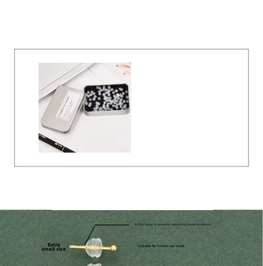 Detail of transparent silicone bullet ear nuts in a silver metal box for 0.4mm studs