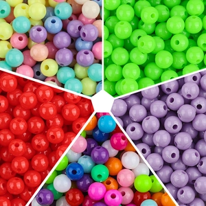 Close-up of colorful round plastic spacer beads for DIY jewelry and bracelet making