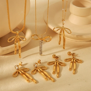 Elegant 18K gold plated stainless steel bow jewelry set with necklaces and earrings