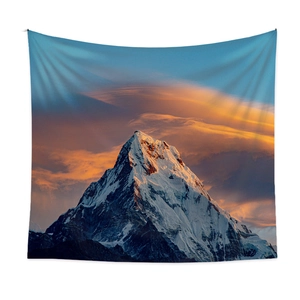 Bohemian snow mountain tapestry showing a golden sunset over snowy peaks for wall decor