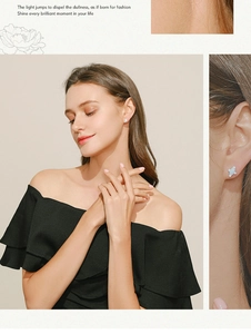 Detailed view of s925 silver stud earrings with white opal clover design on model
