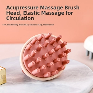 Detailed macro view of soft silicone bristles on a scalp massage brush in beige and pink