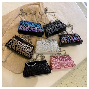 Collection of sequined evening clutch bags with ring handles and chain straps in varied colors