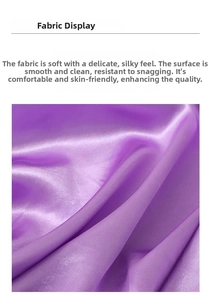 Macro shot of smooth purple satin fabric detail with elegant glossy texture and drape