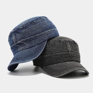 Washed denim cadet cap in dark blue and charcoal gray with minimalist vintage workwear style