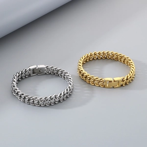 Detail of silver and gold hip hop keel bracelets with polished stainless steel clasp