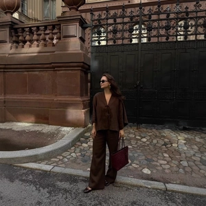 Women's chocolate brown linen two-piece set with tie-waist top and wide-leg trousers