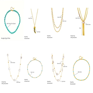 Vintage 18K gold plated necklace collection with pearls, enamel, and tassels charms