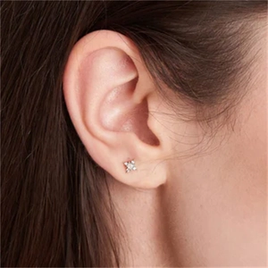 Close-up of S925 silver marquise sun stud earring with opal and cubic zirconia inlay