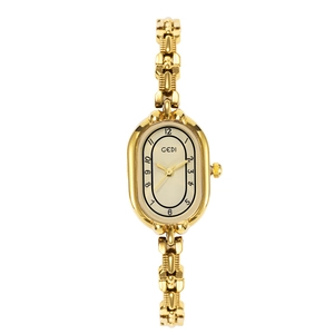 Elegant gold vintage quartz watch for women with oval dial and metal chain bracelet strap