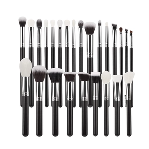 Professional 26-piece makeup brush set with black handles and synthetic bristles on white background