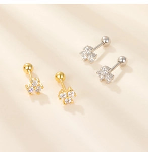 Detailed view of s925 silver flower stud earrings with three zircon stones and screw backs