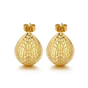 Minimalist golden teardrop earrings with embossed metal texture in 18k gold plating