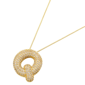 Macro view of 18K gold plated letter Q balloon pendant with pavé cubic zirconia