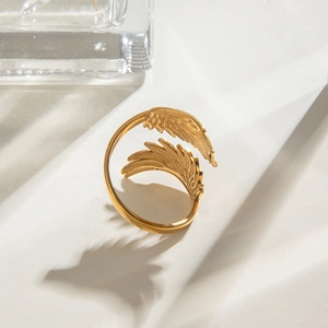 Vintage gold stainless steel angel wing feather open ring with artistic shadow display