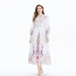 Bohemian floral maxi dress with V-neck, lantern sleeves, and high waist in white linen