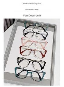 Detailed arrangement of cat-eye optical frames in multiple colors on a grey display tray