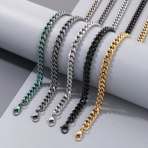 Detail view of five assorted vintage stainless steel curb chains in various metallic colors