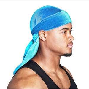 Detail of premium sky blue velvet durag showing soft texture and long tail wrap