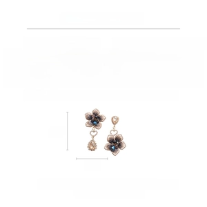 Detailed size and material specs for vintage asymmetric floral earrings with crystals