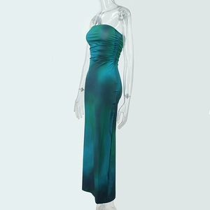 Detail of blue and green gradient tube dress with elegant side ruching and glossy finish