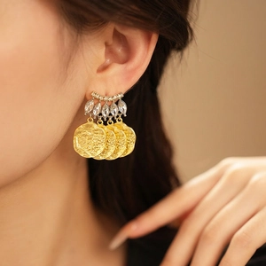 Vintage gold coin earrings with crystal accents and embossed geometric fringe detail