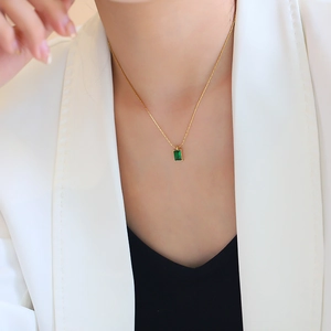 Elegant gold titanium steel necklace with a vintage green emerald geometric pendant