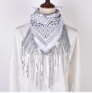 Detail of white paisley bandana featuring shimmering silver sequin fringe and tassels