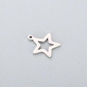 Macro view of a polished stainless steel hollow star pendant for DIY jewelry making