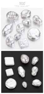 Detailed view of high-gloss baroque ABS imitation pearls in various irregular shapes for DIY