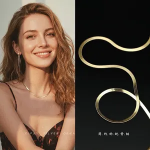 Elegant gold flat snake chain necklace made of stainless steel for a minimalist look