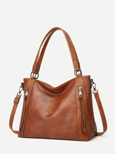 Brown faux leather hobo bag with vintage metal zipper and detachable long shoulder strap