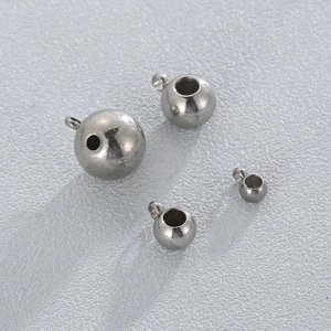 Polished stainless steel hollow beads with loop rings in four different sizes for jewelry