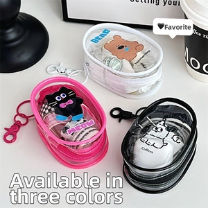 Detailed view of clear PVC mini zipper pouches with cute cartoon animal patterns and carabiners