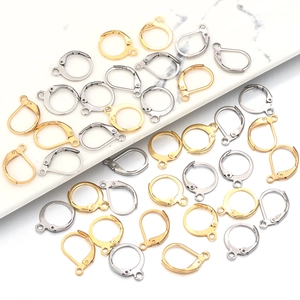 Macro detail of gold and silver lever back earring hooks for DIY jewelry making