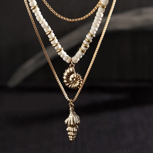 Men's summer coconut bead necklace with layered gold shell pendants for beach style