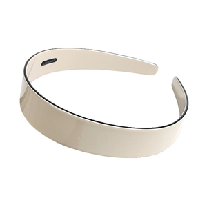 Minimalist beige cream headband with internal anti-slip teeth on a clean white background