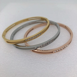4mm titanium steel bangles in gold, silver, and rose gold with embedded cubic zirconia rows