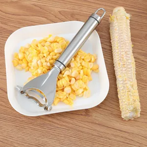 SUS 304 stainless steel corn peeler with ergonomic handle showing efficient stripping results