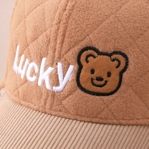 Winter brown quilted fleece aviator hat with Lucky bear embroidery and corduroy brim