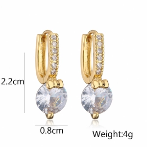 Detail view of gold geometric hoop earrings with zirconia and size dimensions info