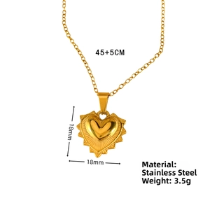 Detail view of 18mm gold heart pendant on 45+5cm stainless steel necklace chain
