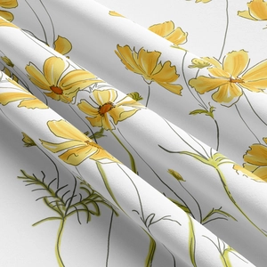Macro shot showing detailed texture of floral tapestry fabric with yellow daisy pattern