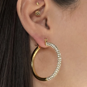 Retro titanium steel gold hoop earrings with sparkling rhinestones on model