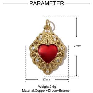 Macro shot of gold heart pendant with red enamel, zircons and precise measurements