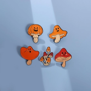 Set of five creative Halloween mushroom enamel pins with pumpkin and ghost faces